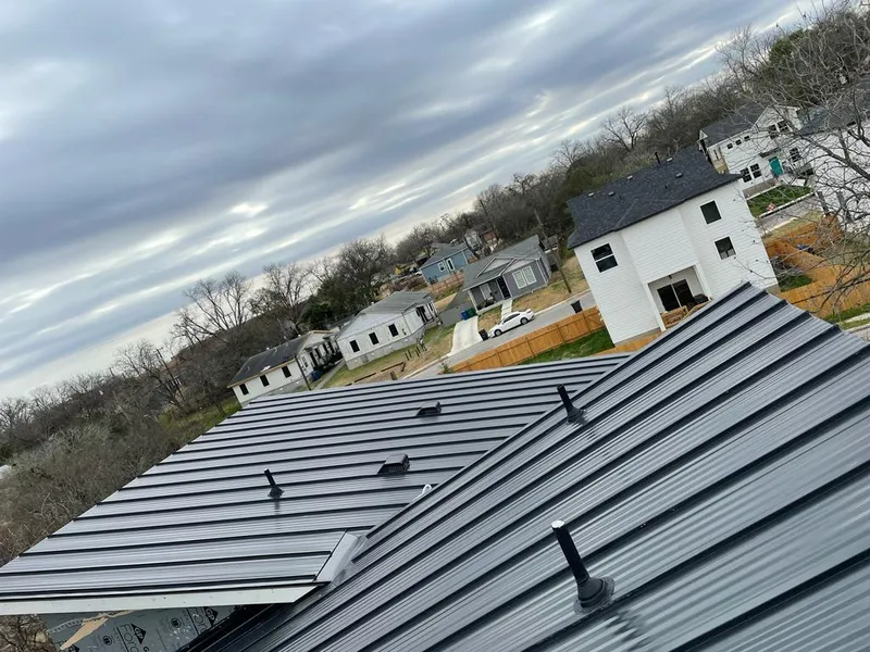 Standing seam metal roof panels with vents for Skylight Repair in Glasgow Village